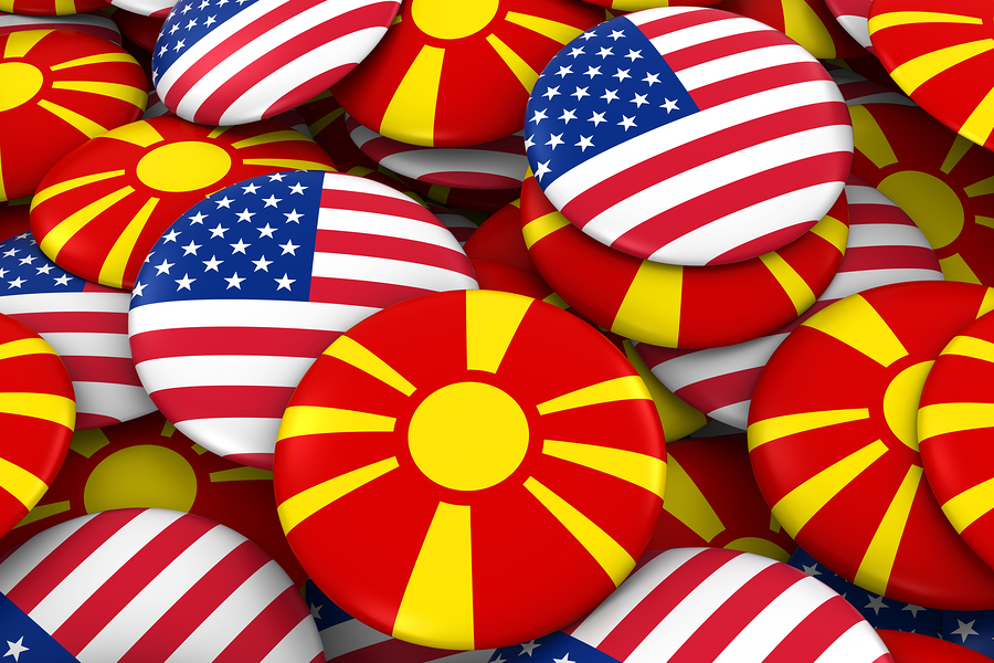 USA and Macedonia Badges Background - Pile of American and Macedonian Flag Buttons 3D Illustration